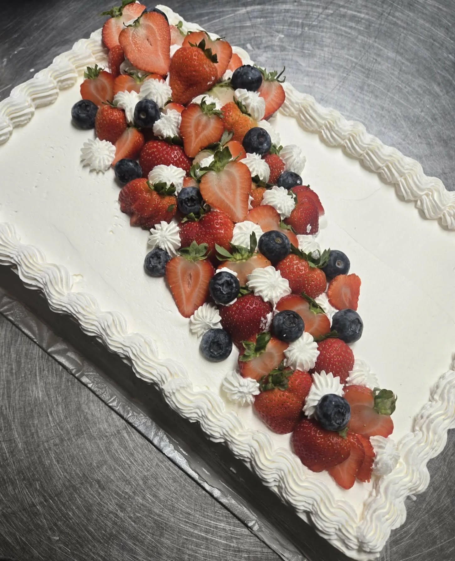 May be an image of strawberry and cake